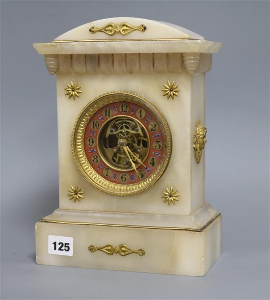 A 19th century alabaster French mantel clock with skeletonised centre height 29cm